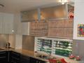 Lift up bi-fold doors look great and are out of the way when open