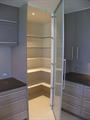 Walk in pantry to make the most of hard to utilize corners